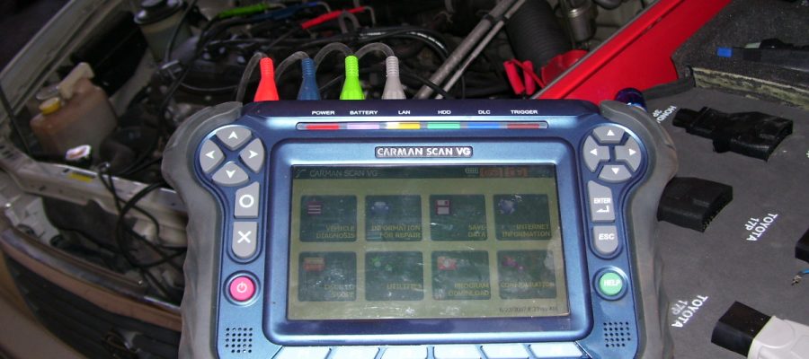 Computer diagnostic equipment plugged into a car